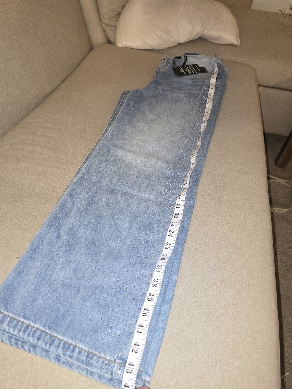 Light Blue Wide-Leg Jeans with Subtle Rhinestone Detail